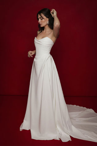 Whisper design for custom gowns and occasion fashion